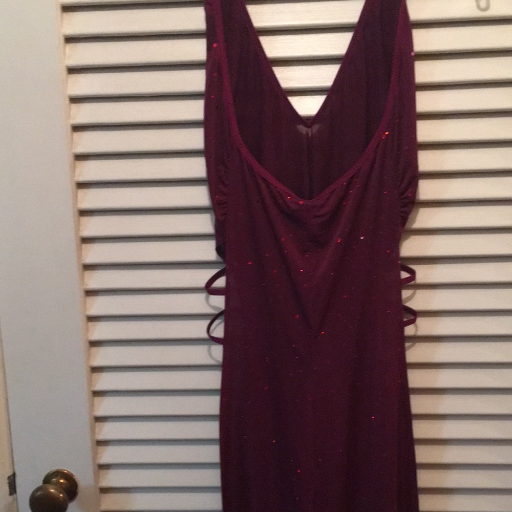 New never worn purple gown with full side slits